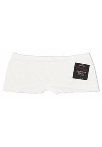 White seamless low-cut panty made from soft material, featuring a scalloped edge design and a black label with product details.