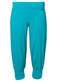 Pantalons capri turquoise en matériau léger et extensible. Dotés d'une large taille et de poignets froncés à l'ourlet.