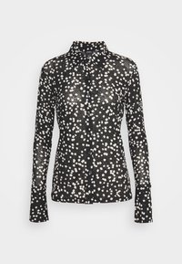Chemise noire à boutonnières, composée d'un tissu transparent avec un motif géométrique blanc, à manches longues et avec un design de col classique.