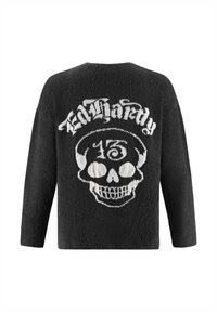Zwarte oversized trui met een fuzzy textuur, voorzien van een witte schedelafbeelding en "Ed Hardy" tekst op de achterkant. Rond de hals, met lange mouwen.
