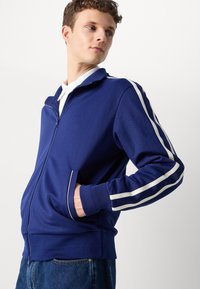 GANT TRACKSUIT JACKET - Bluză de trening - rich navy