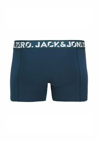 Marineblaue Boxershorts aus weichem Stoff, mit einem breiten elastischen Bund und dem weißen Logo "JACK & JONES". Sanfte Textur, figurschnitt.