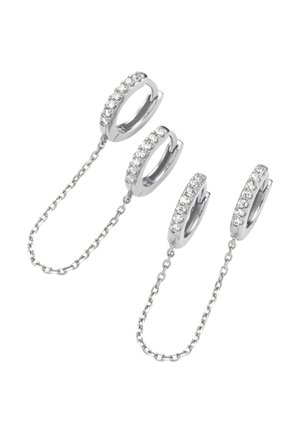 Silver earrings with three linked hoops, each adorned with a row of small clear stones. Chains connect each hoop. Smooth texture.