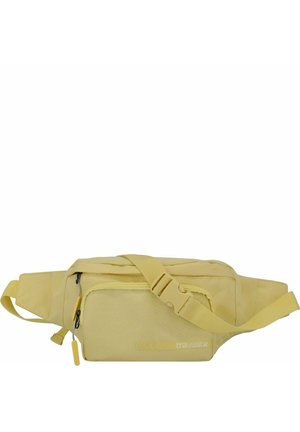 Riñonera de tela amarilla con correa ajustable, dos compartimentos con cremallera y logo "travelite" en el bolsillo frontal.