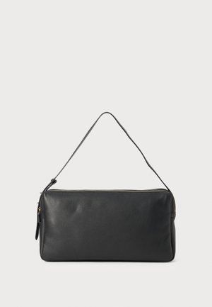 Black leather handbag with a slim rectangular shape, zip closure, and a single shoulder strap. Features a smooth texture and minimalistic design.
