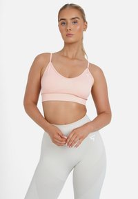 LEGACY SEAMLESS STRAP BACK  - Light support sports bra - light pink