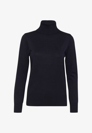 Merino villaneule, joka on valmistettu ribattuista neulekuiduista. Ominaisuuksiin kuuluvat pitkät hihat, istuva siluetti ja korkea kaulus, jossa on ribattu reuna.