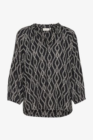 Blouse noire avec une coupe ample, des manches trois-quarts et un motif de vignes blanches. Encolure arrondie avec des accents froncés et un ourlet arrière plus long.