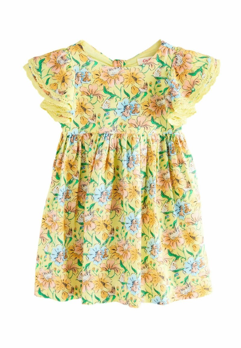 Gelbes Blumenkleid mit kurzen, gerafften Ärmeln, das mit rosa und blauen Blumen verziert ist. Elastischer Bund und ein Knopfverschluss auf der Rückseite. Leichter Stoff.