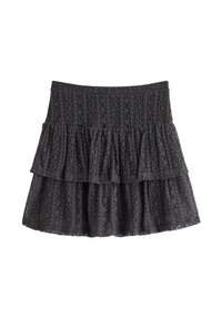 Grå lagerkjol gjord av texturerad tyg. Har tre volanglager med ett mönstrat design. Elastiskt midjeband för en bekväm passform.
