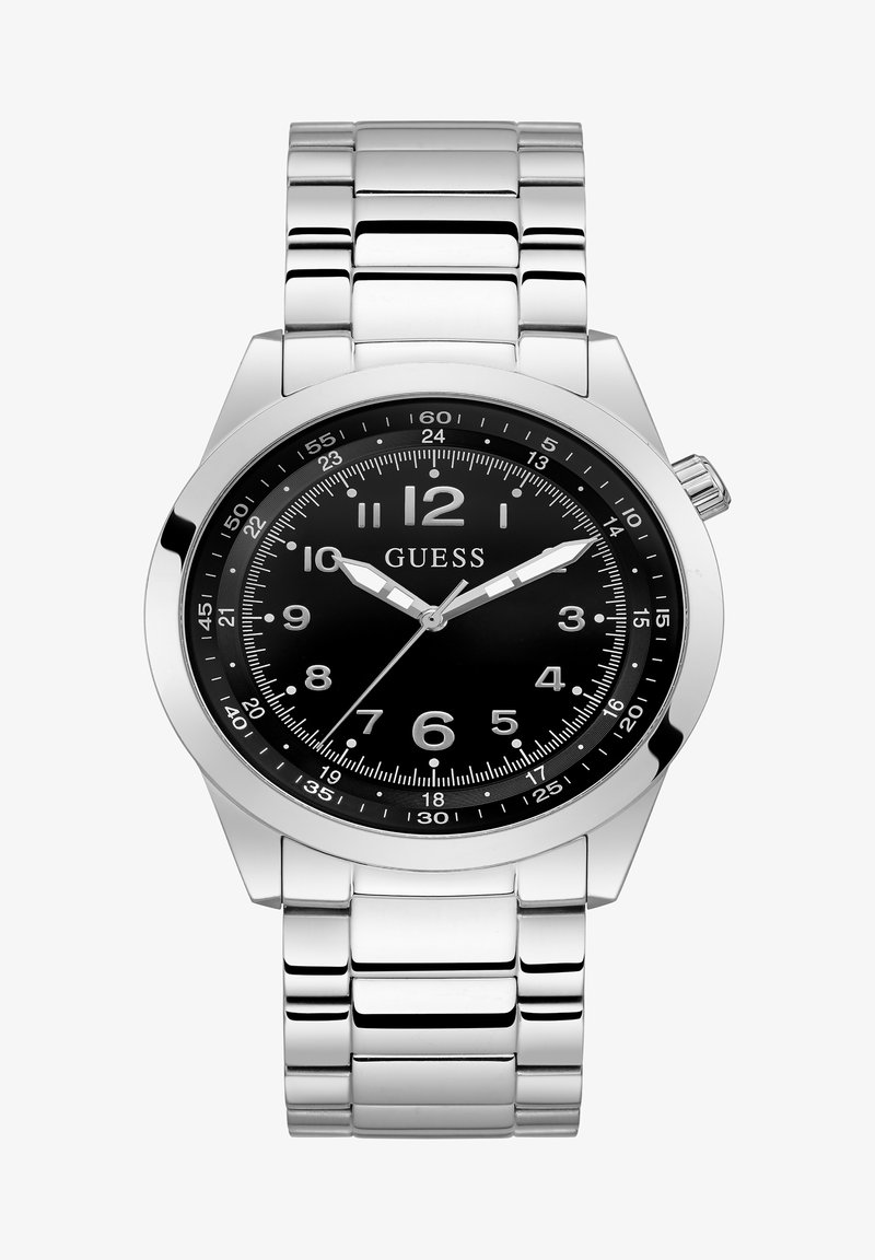 Ezüst rozsdamentes acél óra kerek fekete számlappal, nagy fehér számokkal és ezüst óra- és percmutatókkal. Kapcsolt fém szíjjal rendelkezik.