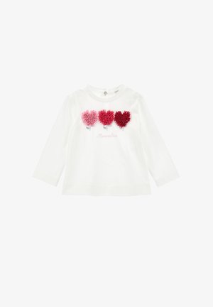 Camicia bianca in cotone a maniche lunghe con tre motivi a cuore in diverse tonalità di rosa e rosso, con la scritta "Monalisa" ricamata sotto.