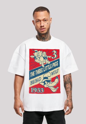Hvit oversized t-skjorte med retro-print av "De tre små grisene" og Den store stygge ulven, med sterke farger og lekne grafikker.