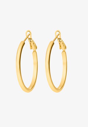 Goldfarbene Creolen mit einer glatten, glänzenden Oberfläche und einem sicheren Verschluss. Rundform, mittlere Größe und minimalistisches Design.