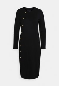 Černé dlouhé šaty s kulatým výstřihem a postranním detailem s knoflíky, které mají zlatou barvu, vyrobené z hladké, elastické tkaniny.