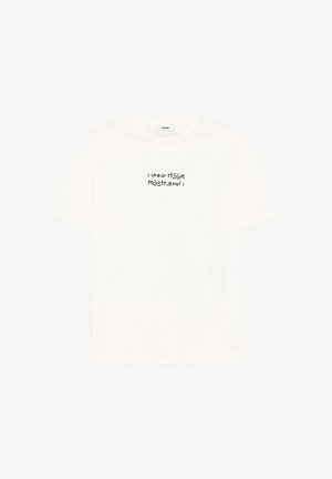 Maglietta bianca a maniche corte con testo nero "I wear MSGM" e "Love MSGM" speculare al centro anteriore sotto la scollatura.