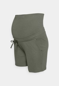 Těhotenské šortky v olivové barvě, vyrobené z měkké bavlněné směsi. Mají široký, elastický pas a šnurování, s bočními kapsami.