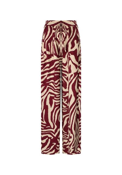 Pantalones de pierna ancha en un estampado de cebra burdeos y crema, con cintura ajustable, fabricados en tela suave y de diseño fluido.