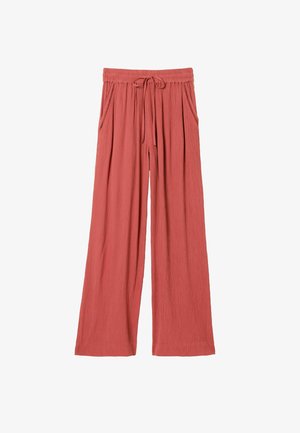 Hose mit weitem Bein aus weichem Korallenstoff. Verfügt über einen elastischen Bund mit Kordelzug und Seitentaschen. Die strukturierte Oberfläche sorgt für zusätzliche Details.