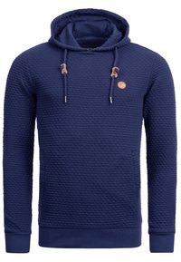Sweat à capuche bleu marine texturé avec cordons, présentant des accents beige et un petit logo rond sur la poitrine, poignets et taille côtelés.