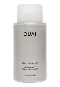 Transparent frostad flaska med ett vitt lock, märkt "OUAI BODY CLEANSER," 10 fl oz/300 ml, med en elegant design.