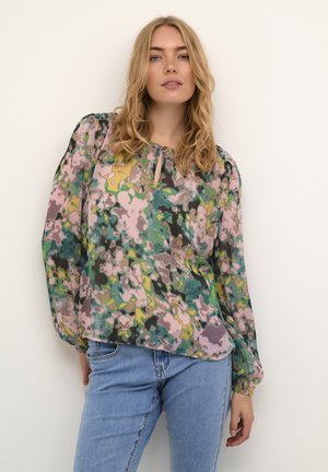 Flowy, multicolored blouse with a floral pattern in shades of green, pink, and yellow. Features long sleeves and a round neckline.