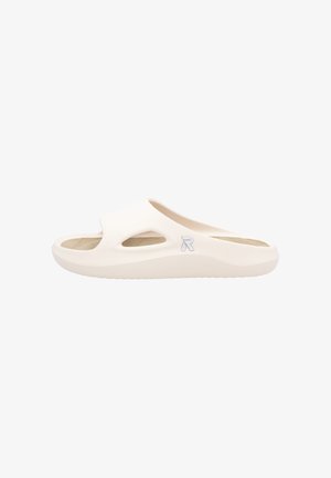 Ivory slide sandal with a smooth, flexible design. Features cut-out sections on sides, textured footbed, and a subtle logo accent.