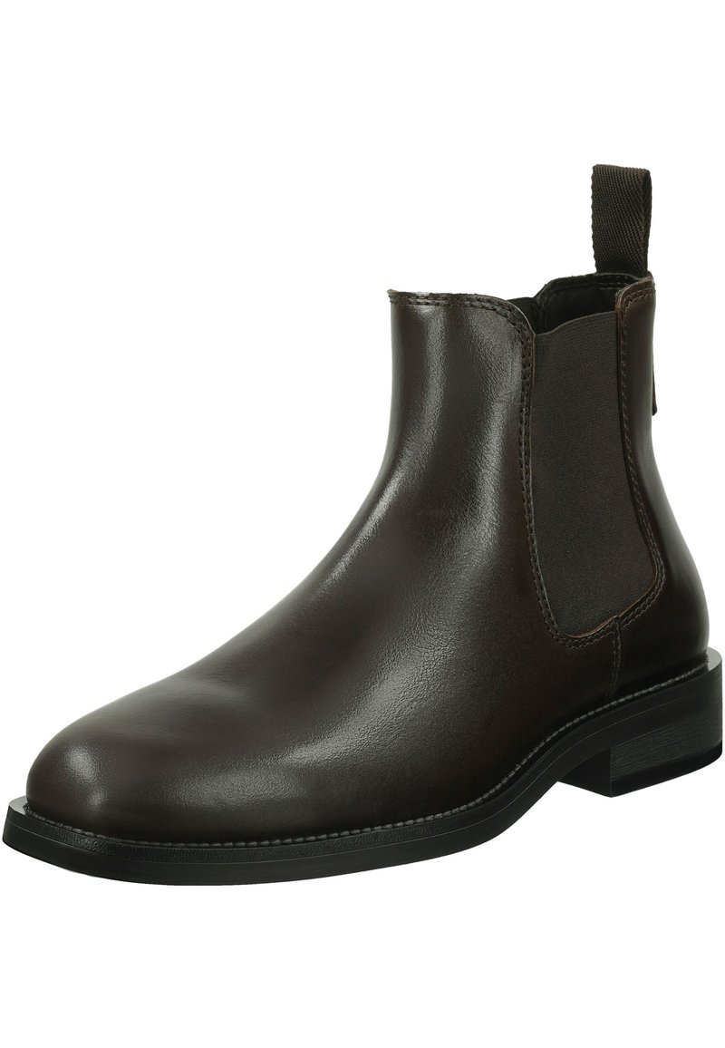 Bottine Chelsea en cuir marron avec des panneaux élastiques sur les côtés, un bout arrondi et un petit talon bloc. Texture lisse avec des détails de couture renforcée.