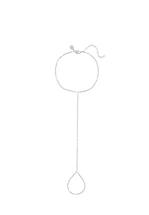 Zierliche silberne Handkette mit verstellbarem Verschluss, die ein Handgelenksarmband mit einer tropfenförmigen Fingerschlaufe verbindet.