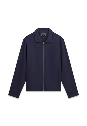 Giacca blu navy con cerniera, maniche lunghe, collo, due tasche frontali e etichetta del marchio Guess all'interno del collo.