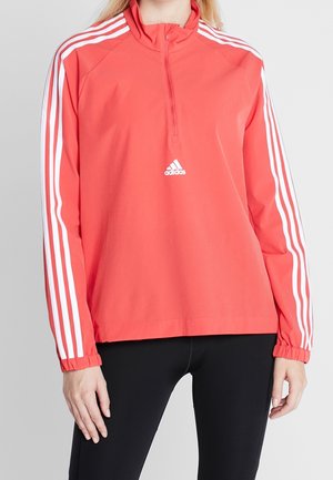Verryttelytakki - red