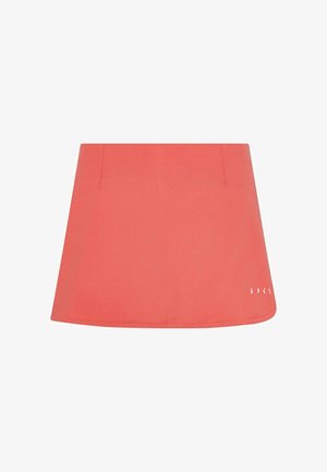 Korallroosa tenniseseel, millel on avar kuju, valmistatud hingavast kangast. Omab tasaseid õmblusi ja väikest logo allservas.