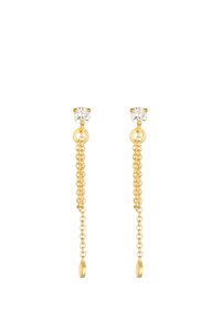 Pendientes de cadena de oro con tachuelas de cristal transparente, con cadenas entrelazadas que caen por debajo. Textura suave con acentos redondos y ovalados.