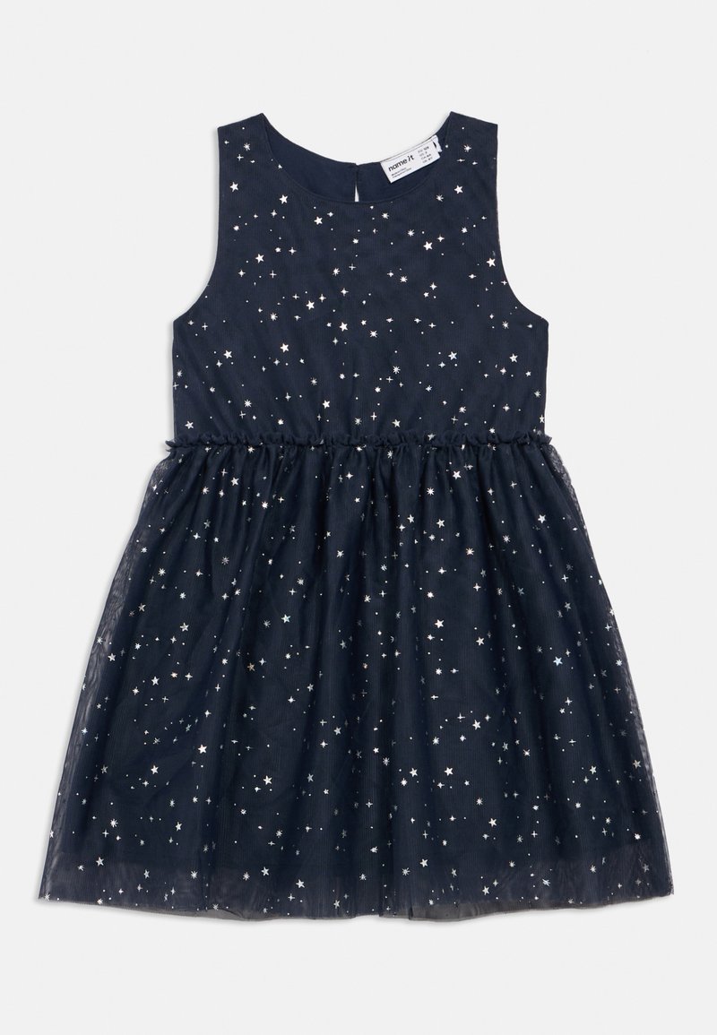 Marinblå ermeløs jentedress med sølvstjerne mønstre, samlet midje og en tulle-overdel.