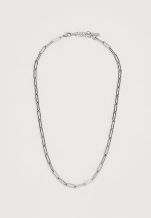 Ασημένια μεταλλική αλυσίδα με εναλλασσόμενους επίπεδους και οβάλ κρίκους, τελειωμένη με κούμπωμα αλυσίδας και αλυσίδα επέκτασης για ρυθμιζόμενο μήκος.