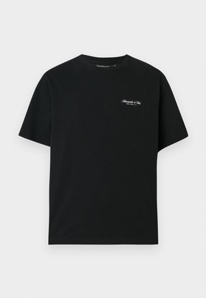 Black cotton t-shirt with short sleeves, crew neck, and small white text logo on the upper left chest. Smooth texture, relaxed fit.