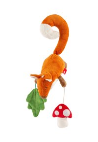 Plush fox toy with curled tail, holding a green leaf and a red-and-white spotted mushroom hanging from strings.