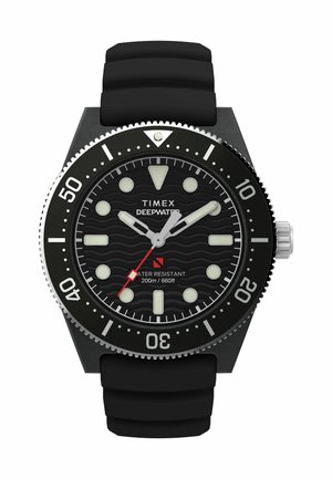 Black Timex Deepwater dive watch with round dial, luminous hands and markers, rotating bezel, and black rubber strap. Water resistant to 200m.