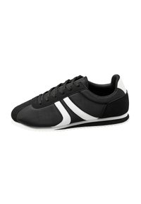 Black sports shoe with white accents, featuring a fabric upper, lace closure, and a textured rubber sole for grip.