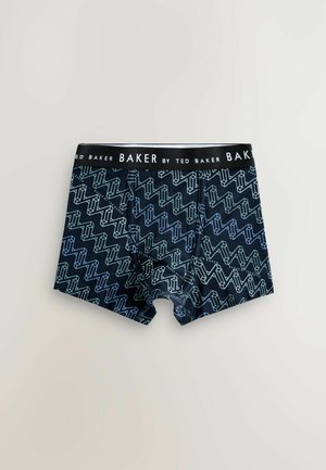 Boxer da uomo blu navy con un motivo geometrico in verde e blu. Tessuto morbido con un ampio elastico con il marchio "TED BAKER".