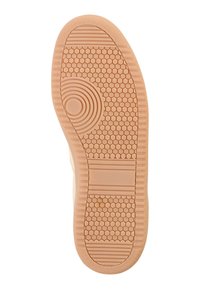 Rubberen sneakerzool in lichtbeige, met een zeshoekig patroon, ronde accenten en textuurkammen voor grip en tractie.