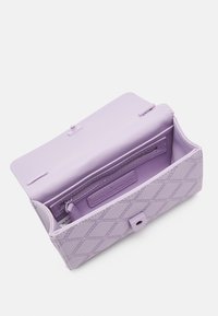 Lavender leather wallet with diamond quilted pattern, a snap closure, and a spacious interior, including a zip pocket and card slots.