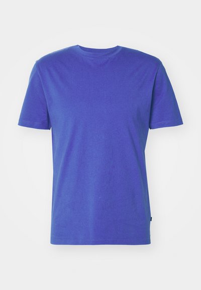 T-shirt z krótkim rękawem w jednolitym fioletowym kolorze, okrągły dekolt, regularny krój, z gładką teksturą i bez widocznych wzorów lub akcentów.