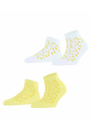 Two pairs of ankle socks, one white and one yellow, both featuring scattered yellow heart and dot patterns.
