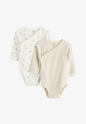 Deux bodies nouveau-nés à manches longues, un uni crème côtelé et un blanc avec de petits imprimés floraux gris et beige, tous deux avec des fermetures à pression.
