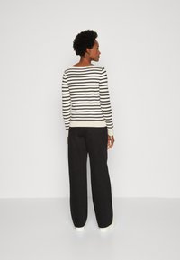 Tommy Hilfiger STITCH BOAT - Maglione - calico/desert sky