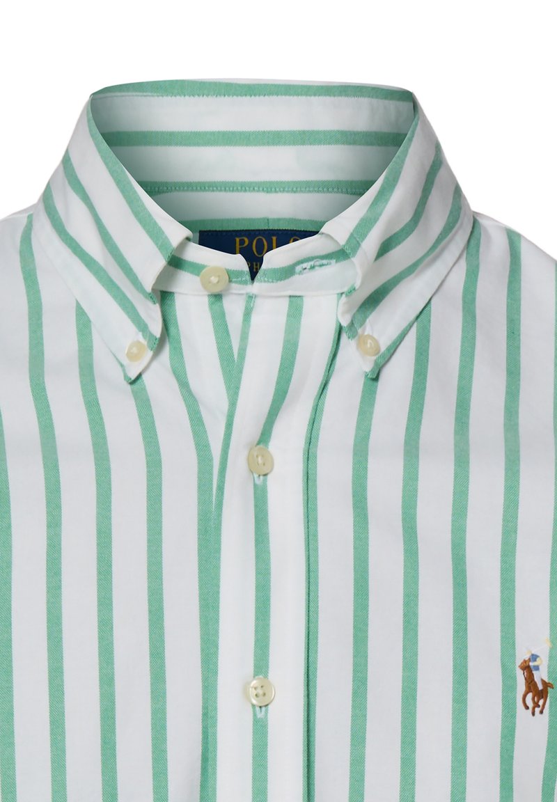 White button-down shirt with vertical green stripes and a small embroidered polo player logo on the chest.