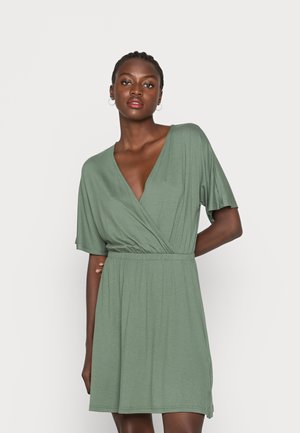 Vestito di maglina - green