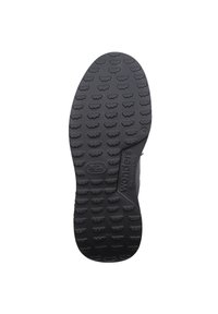 Suela de zapato de goma negra con un patrón texturizado, que presenta formas redondas y onduladas; incluye la marca "wonders" y las marcas de tamaño.