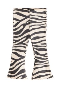 Zebrastribede, vidde leggings i ribstrik, med sort og cremefarvet mønster, bølget kant og tætsiddende talje.